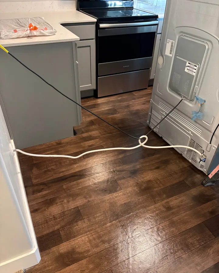 After: the same floor swept and mopped.