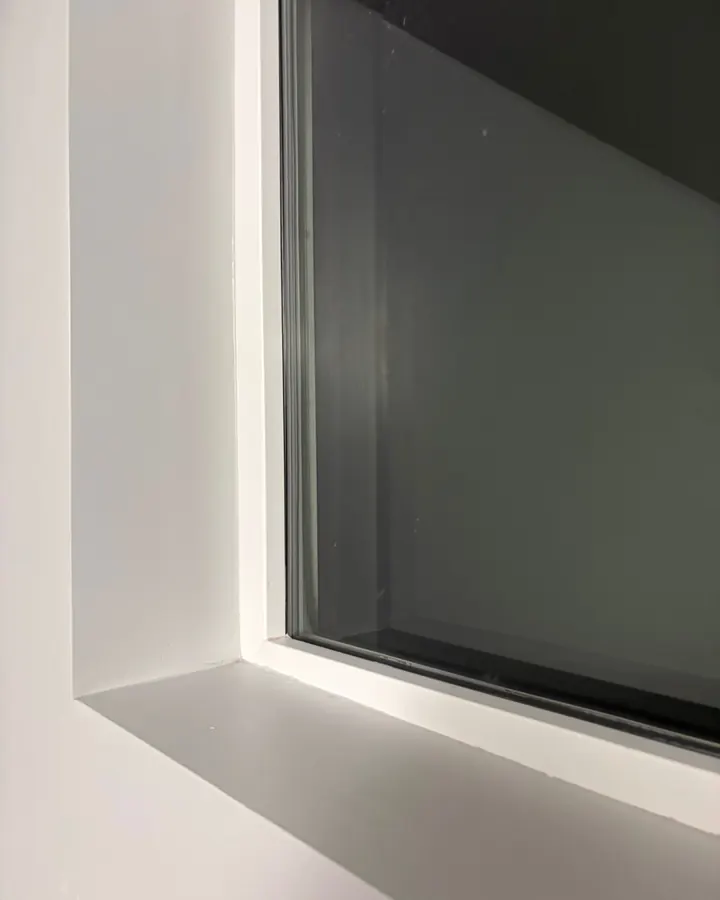 After: the same window with the paint residue removed.